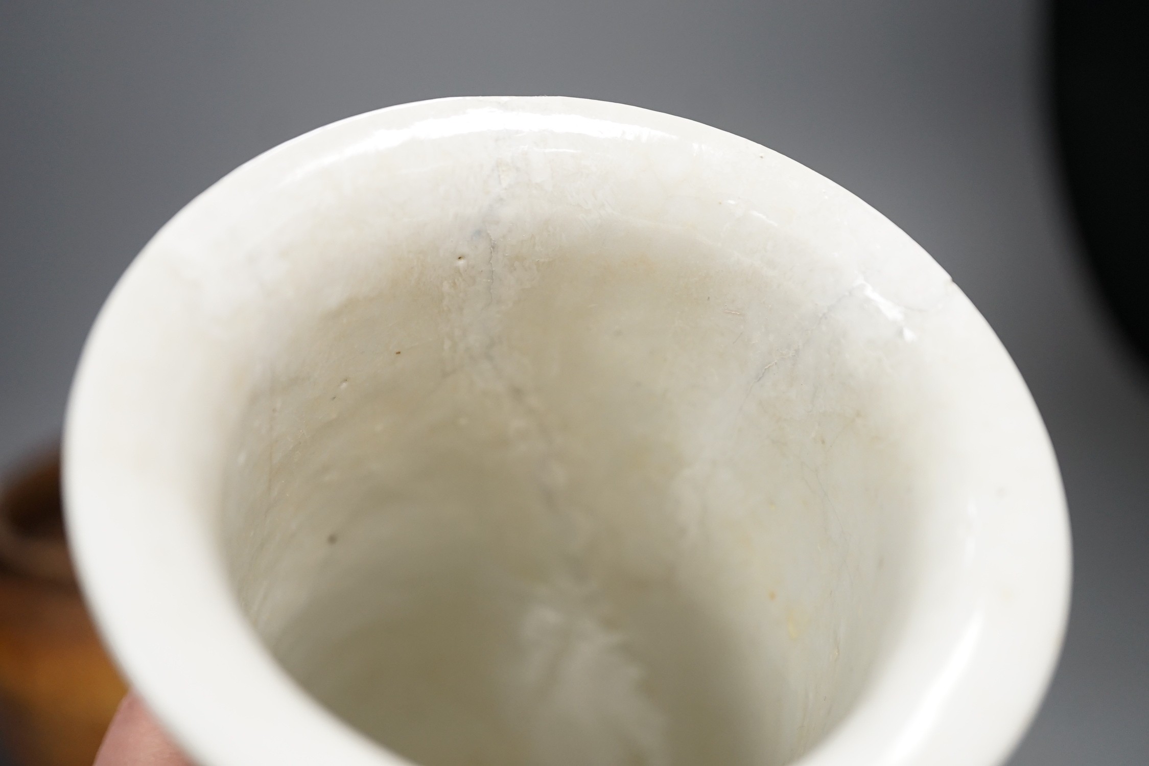 A Chinese crackle glaze blue and white sleeve vase, 20cm high, similar dish and pottery vessel